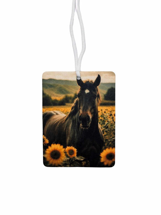 Horse in sunflower field