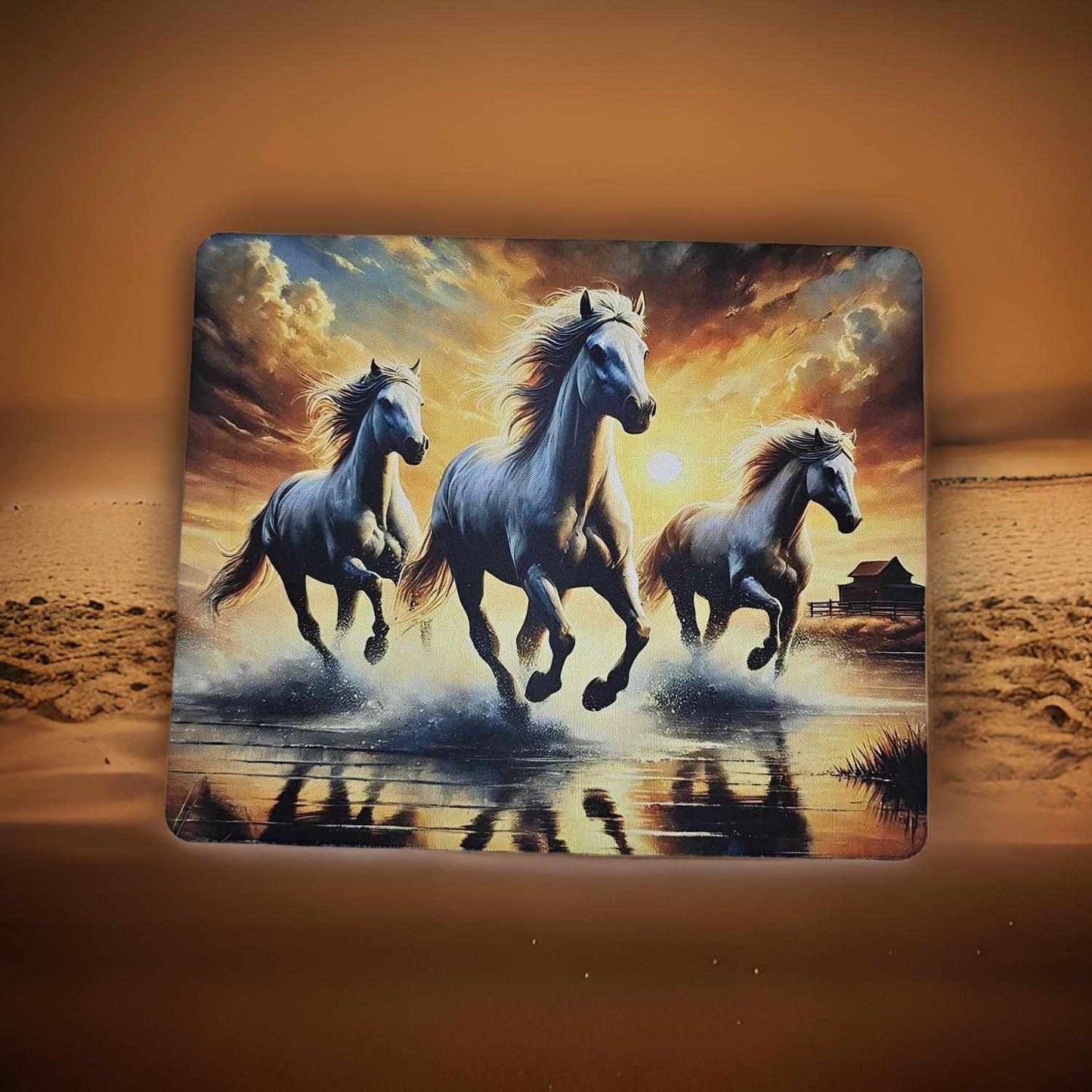 Horses running on the beach