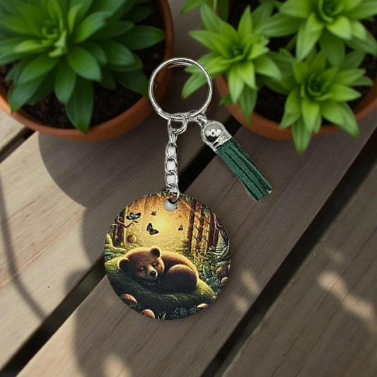 Cute sleeping cub in the forest