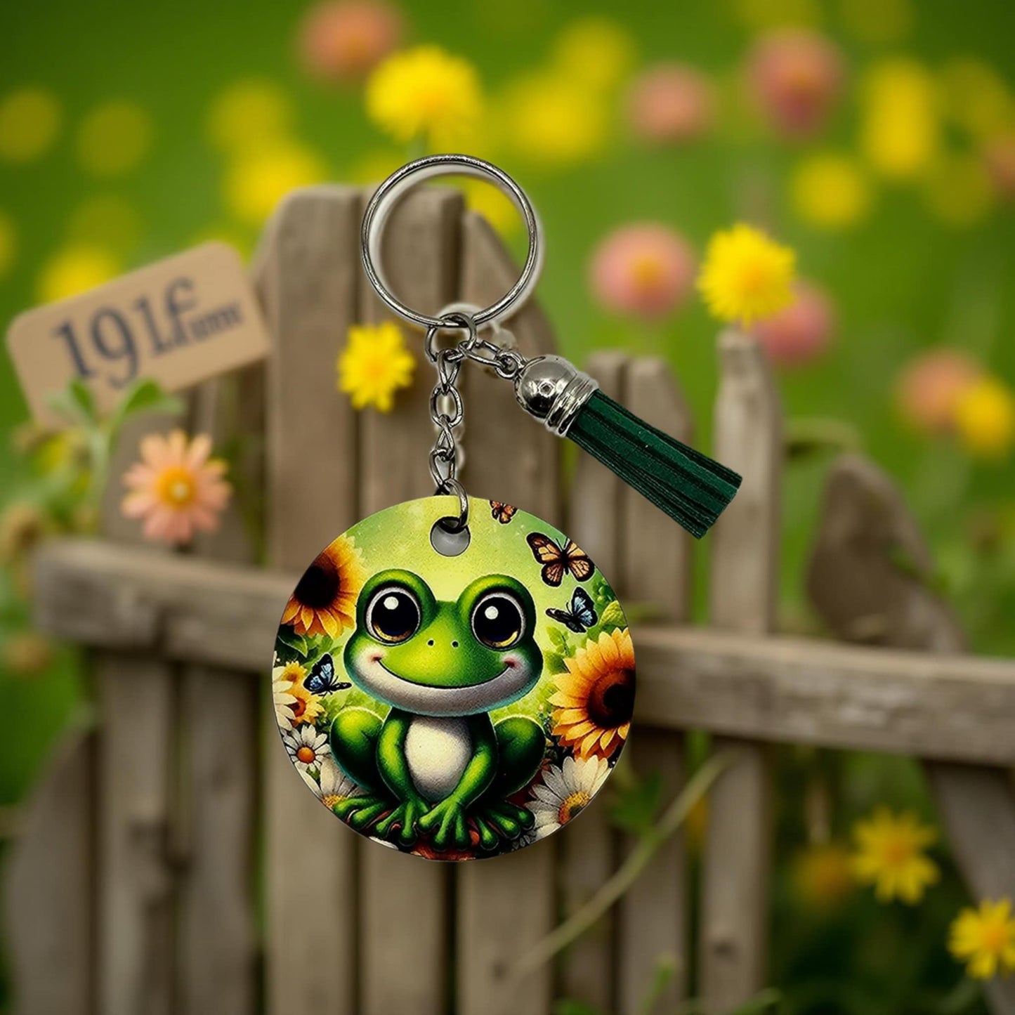 Cute frog and sunflowers