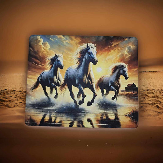 Horses running on the beach
