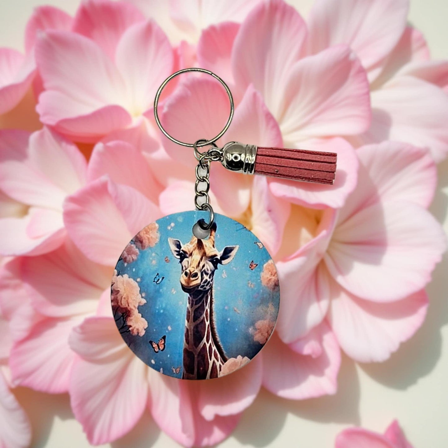 Giraffe and pink flowers