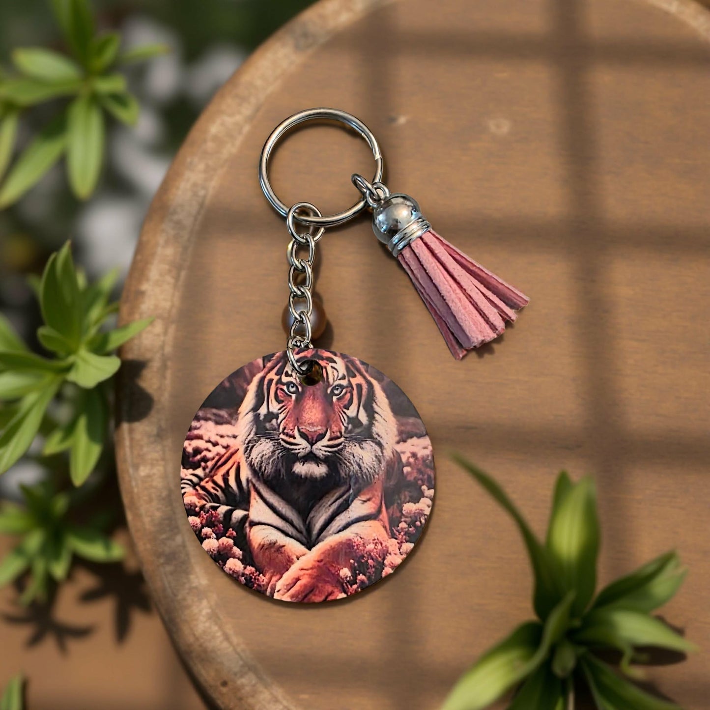 Tiger resting with pink flowers