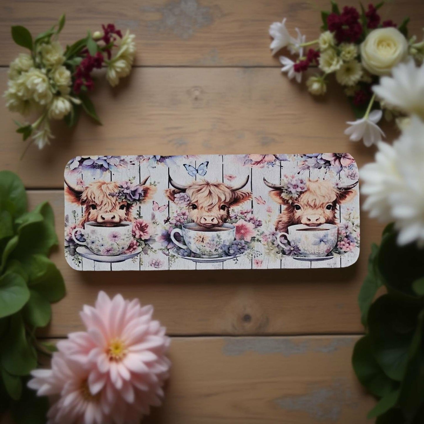 3 cute Highland cows in tea cups