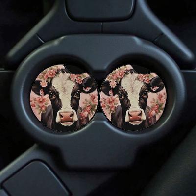 Cow with pink flowers