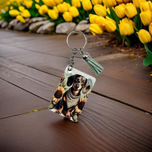 Dachshund with yellow sunflowers