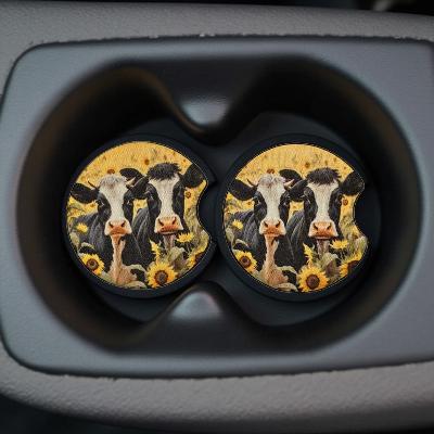 Cows in sunflower field